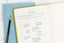 A gratitude journal with motivational ideas written in it