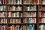 Several shelves full of colorful books