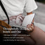 Person holding a notebook with text about its features