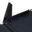 Close-up of a black electronic device with a hinge on a white background